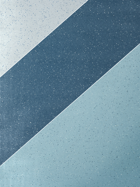 Closeup of commercial sheet flooring with welding rods for infection control